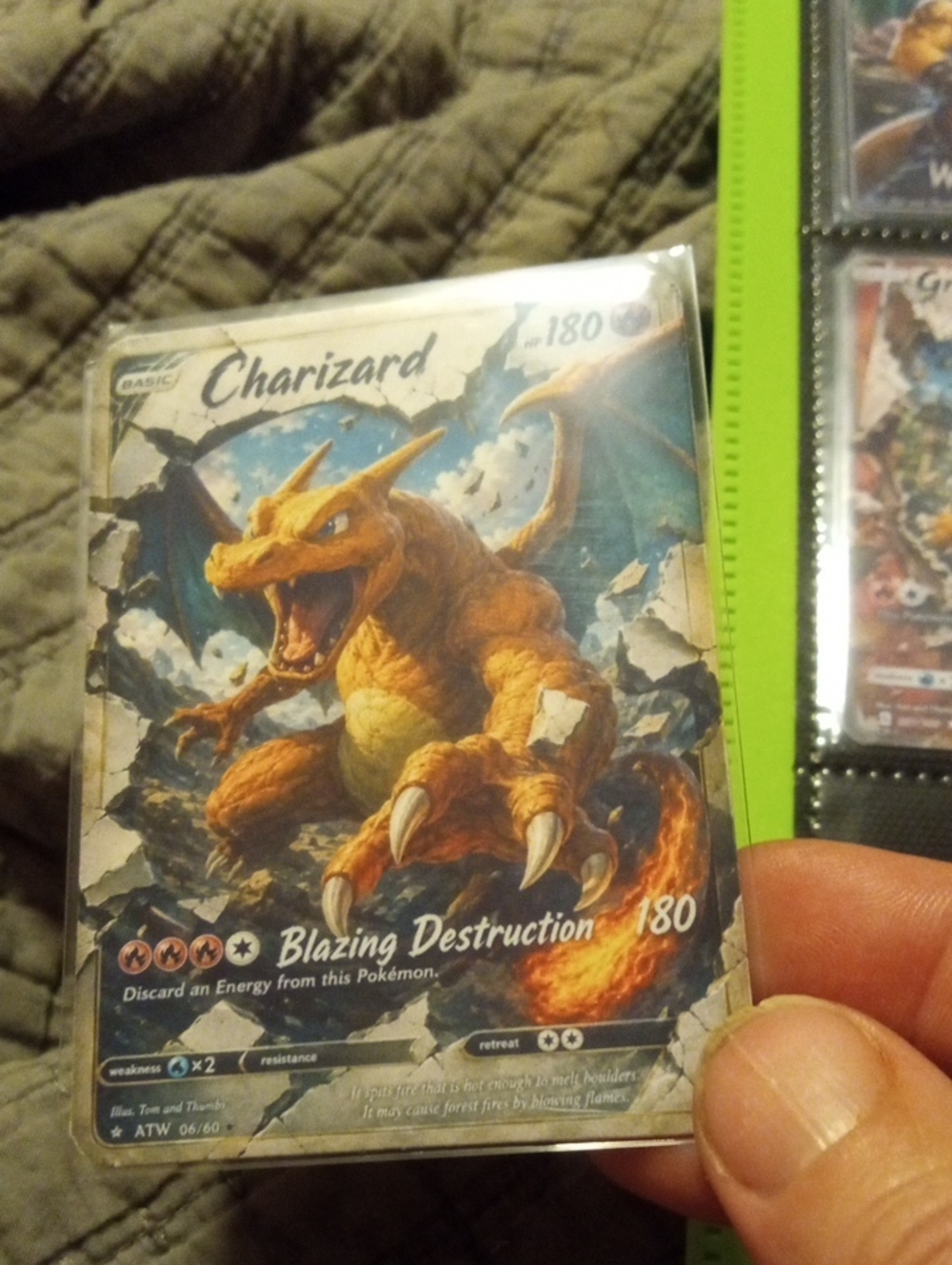 Pokemon Charizard Card with Orange Artwork